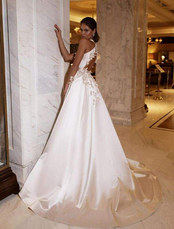 white and silver wedding dress Hypnotic the dress has a fit to flare pattern. OSTTY - Luxury White Wedding